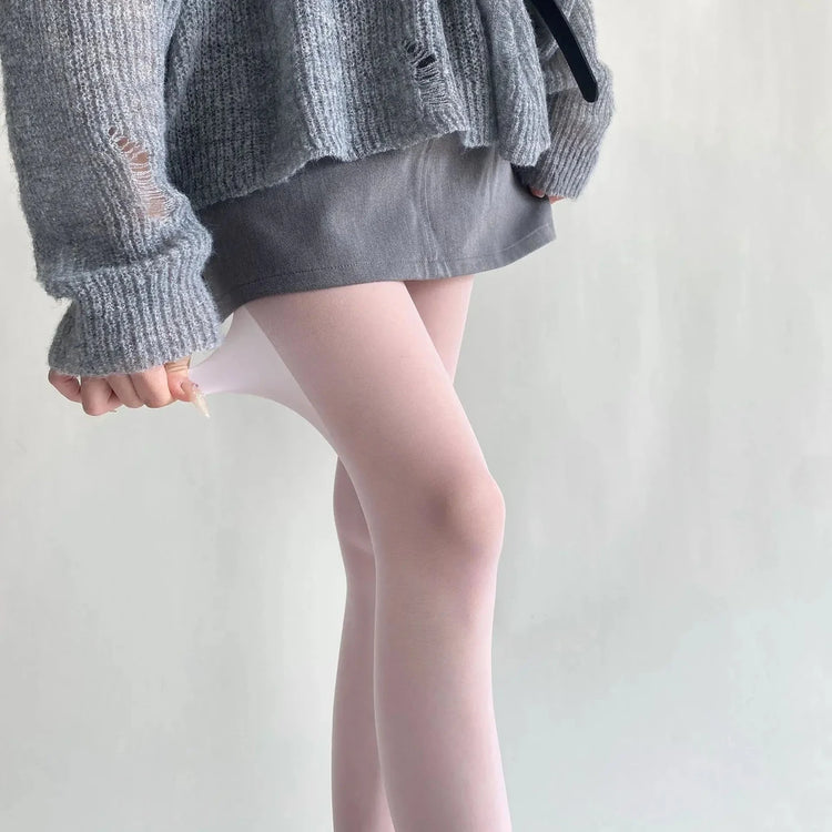 Vibe Legwear: soft pink sheer tights with smooth finish and subtle sheen.