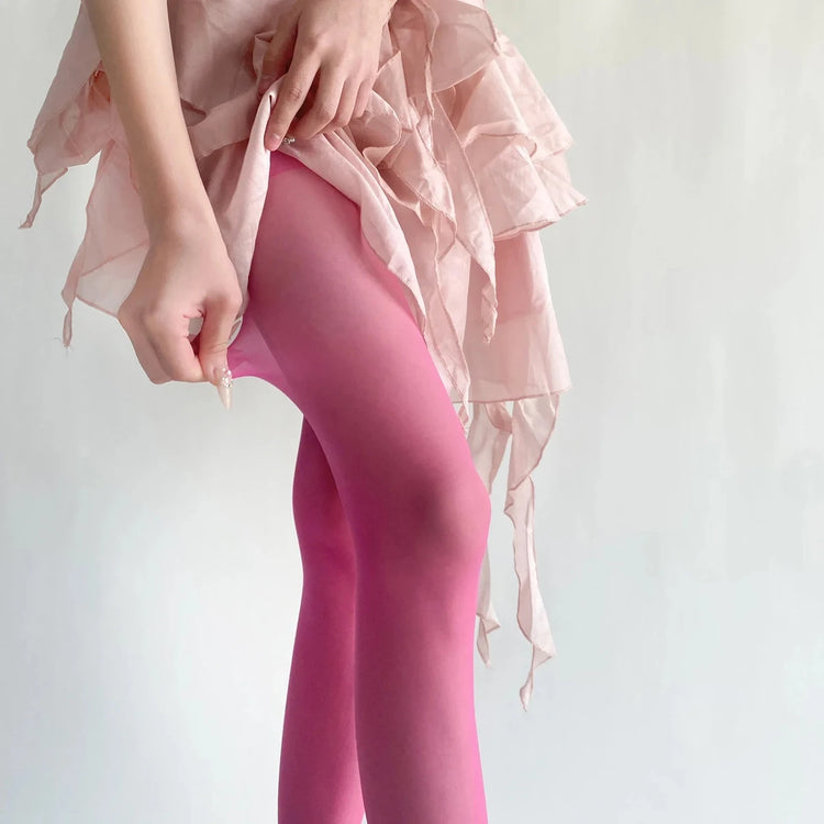 Vibe Legwear: smooth pink tights with subtle sheen and seamless finish.