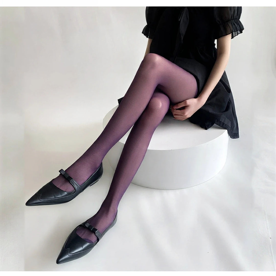 Vibe Legwear: sheer purple tights with subtle sheen and smooth texture.