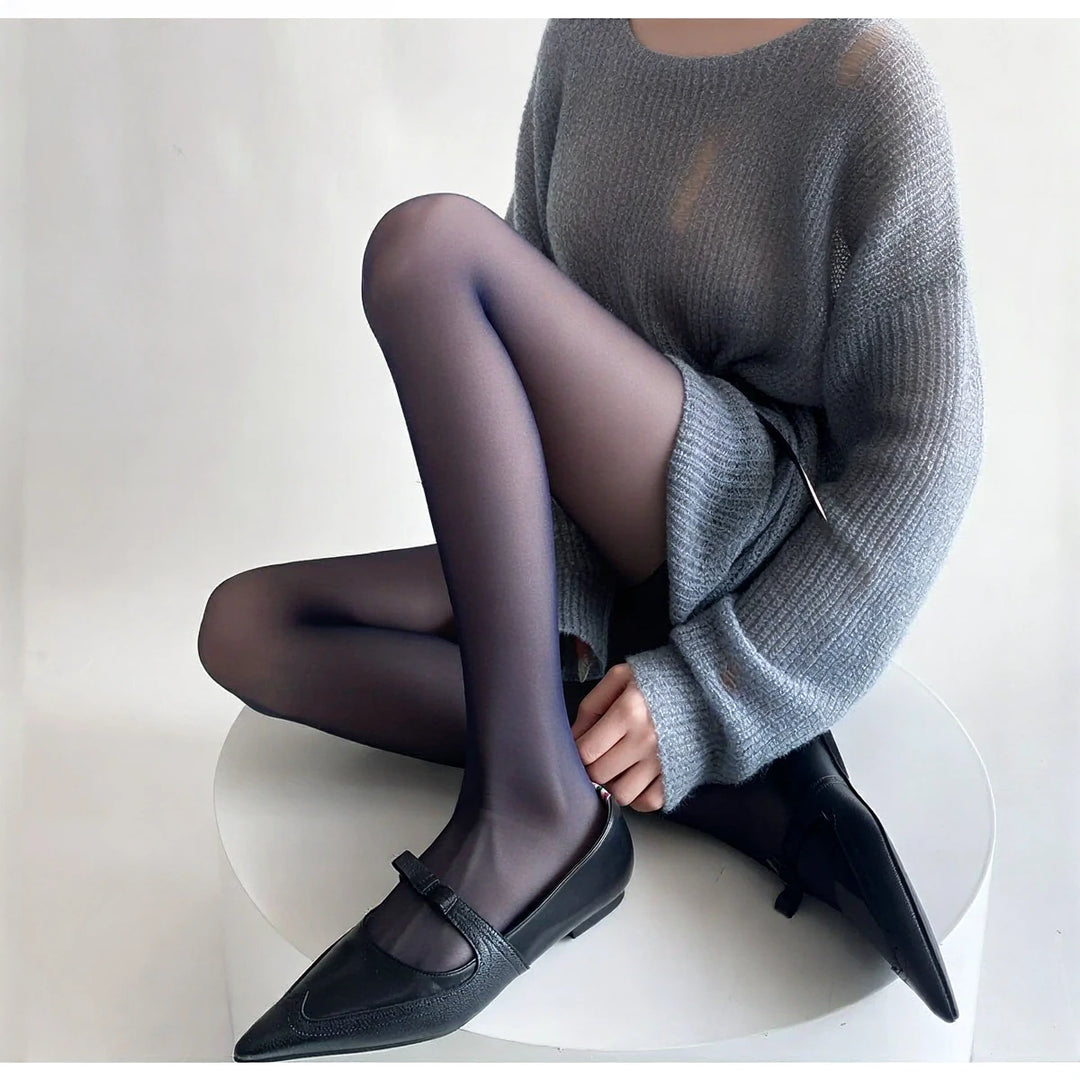 Vibe Legwear: sheer black tights with smooth texture and subtle sheen.