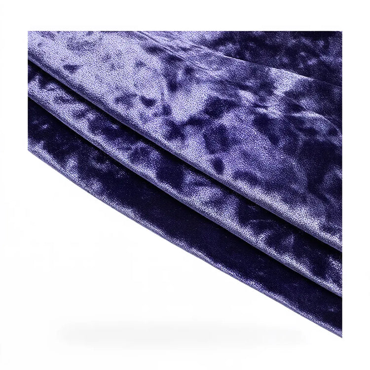 Victoria velvet dress in deep purple, textured fabric with subtle sheen.