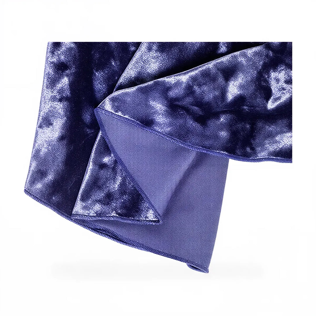 Velvet dress in deep purple with subtle marbled texture and smooth lining.