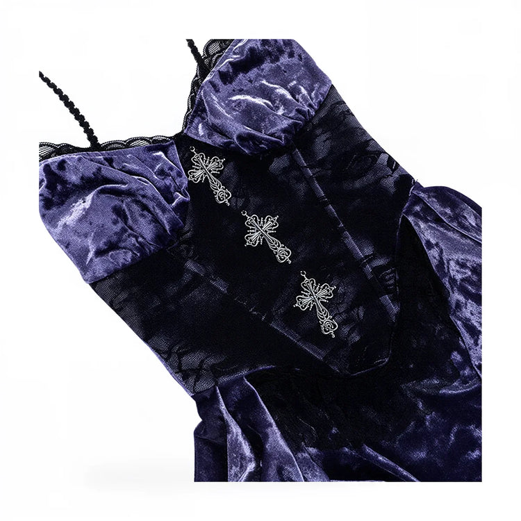 Victoria velvet dress in deep purple, featuring ornate silver cross embellishments.