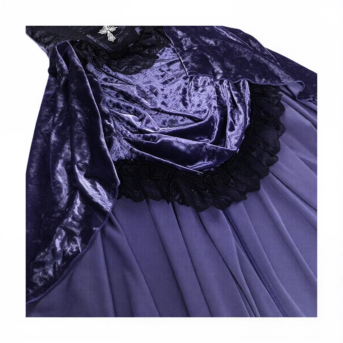 Victoria velvet dress in deep purple, featuring lace trim and ruffled detailing.