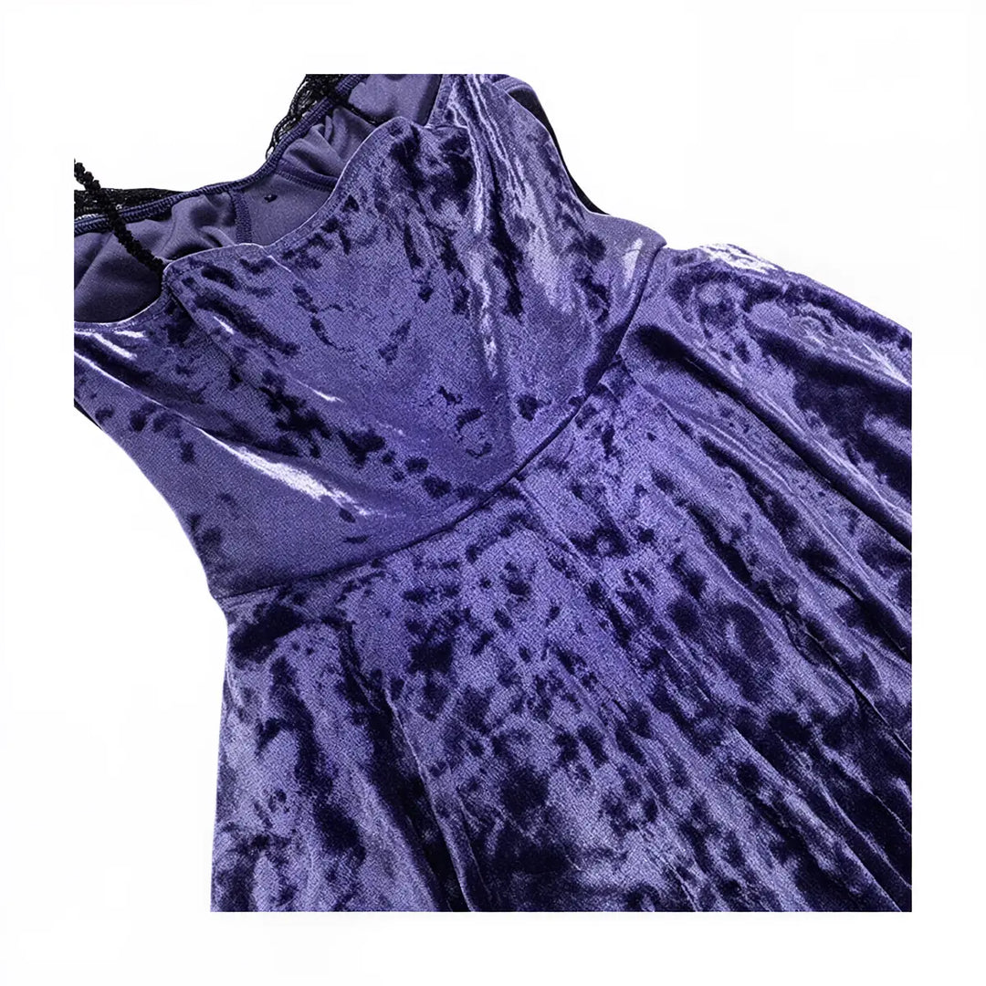 Victoria velvet dress in deep purple, featuring a high neck and textured fabric.