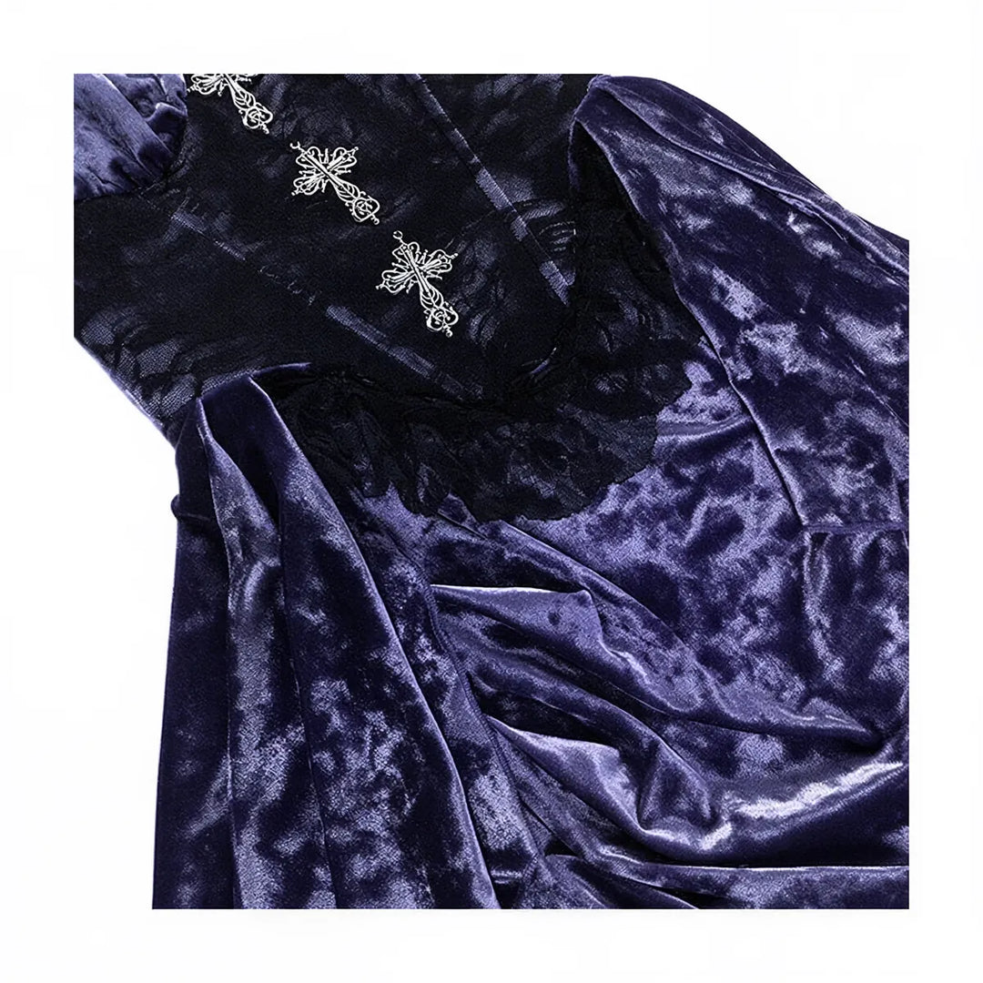 Victoria velvet dress in deep purple with lace and silver cross embellishments.