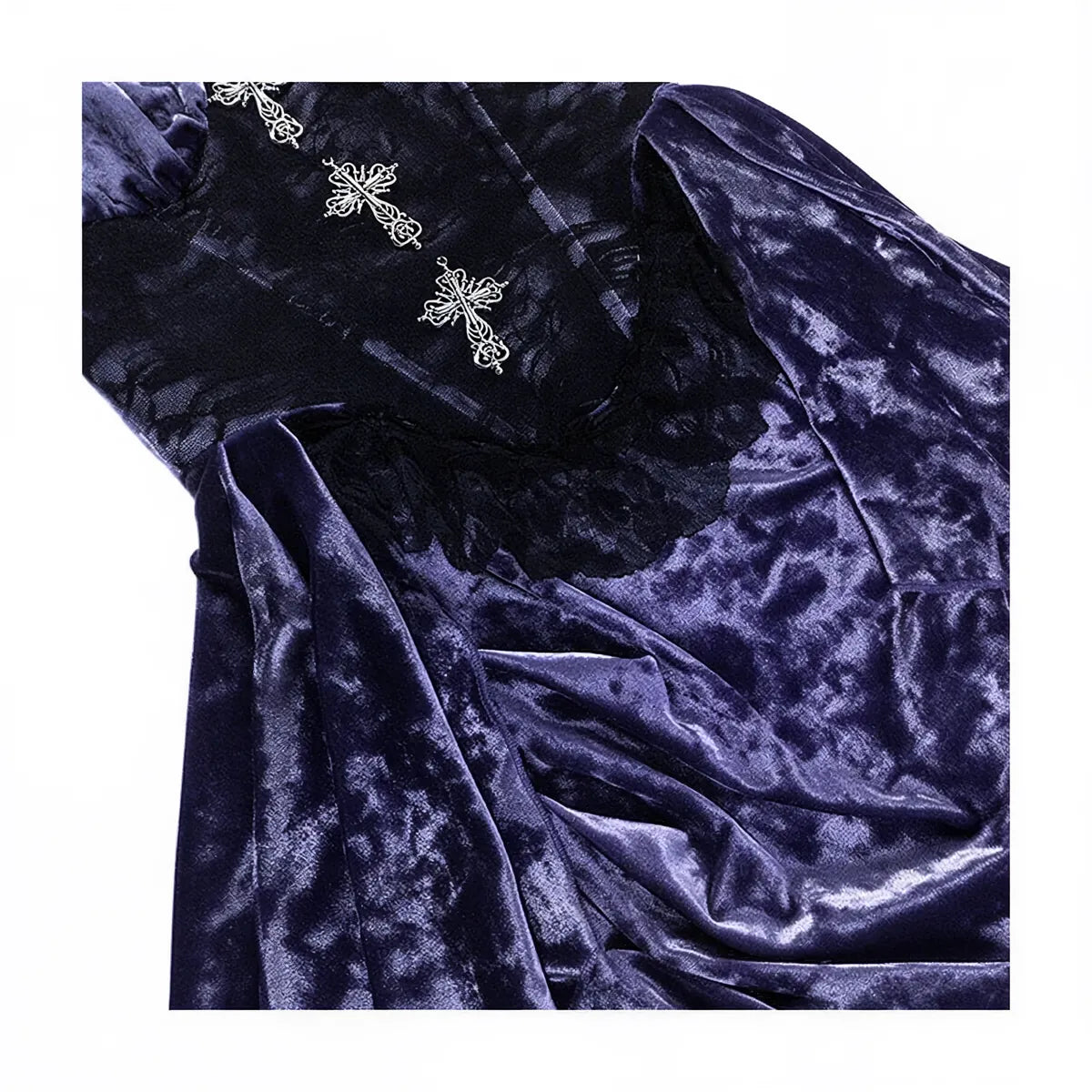 Victoria velvet dress in deep purple with lace and silver cross embellishments.