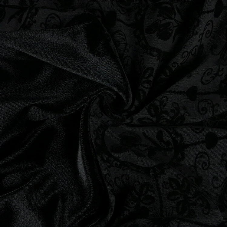 Vintage Goth Dress in black velvet with floral patterned overlay.