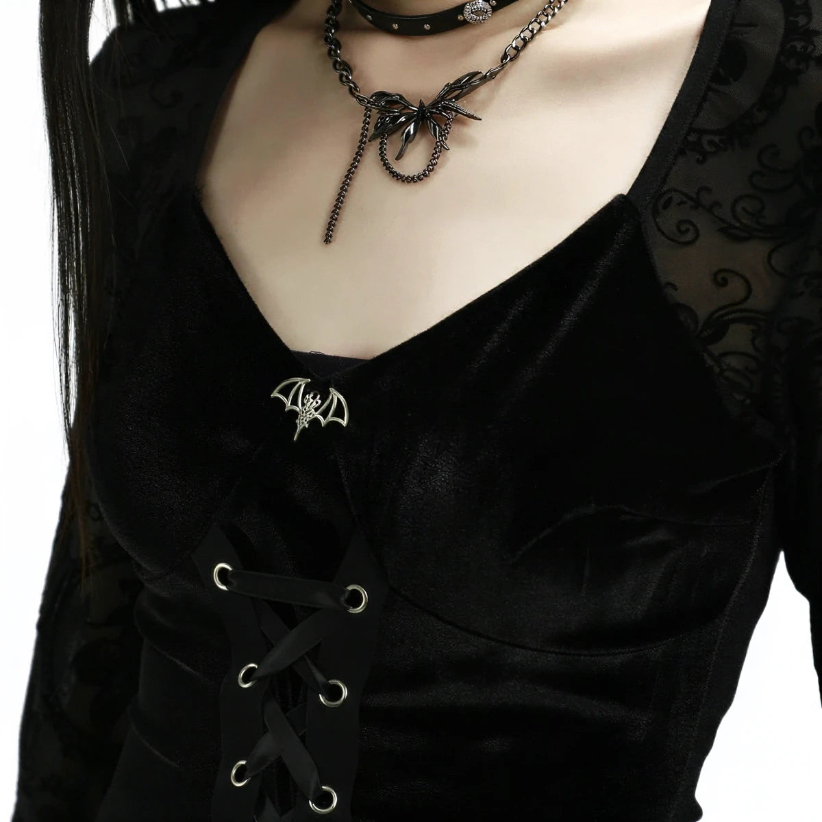 Vintage Goth Dress: black velvet with lace-up front and bat brooch.