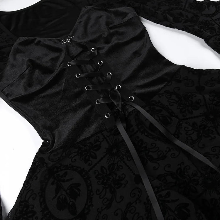 Black velvet goth dress with lace-up front and ruffled neckline.