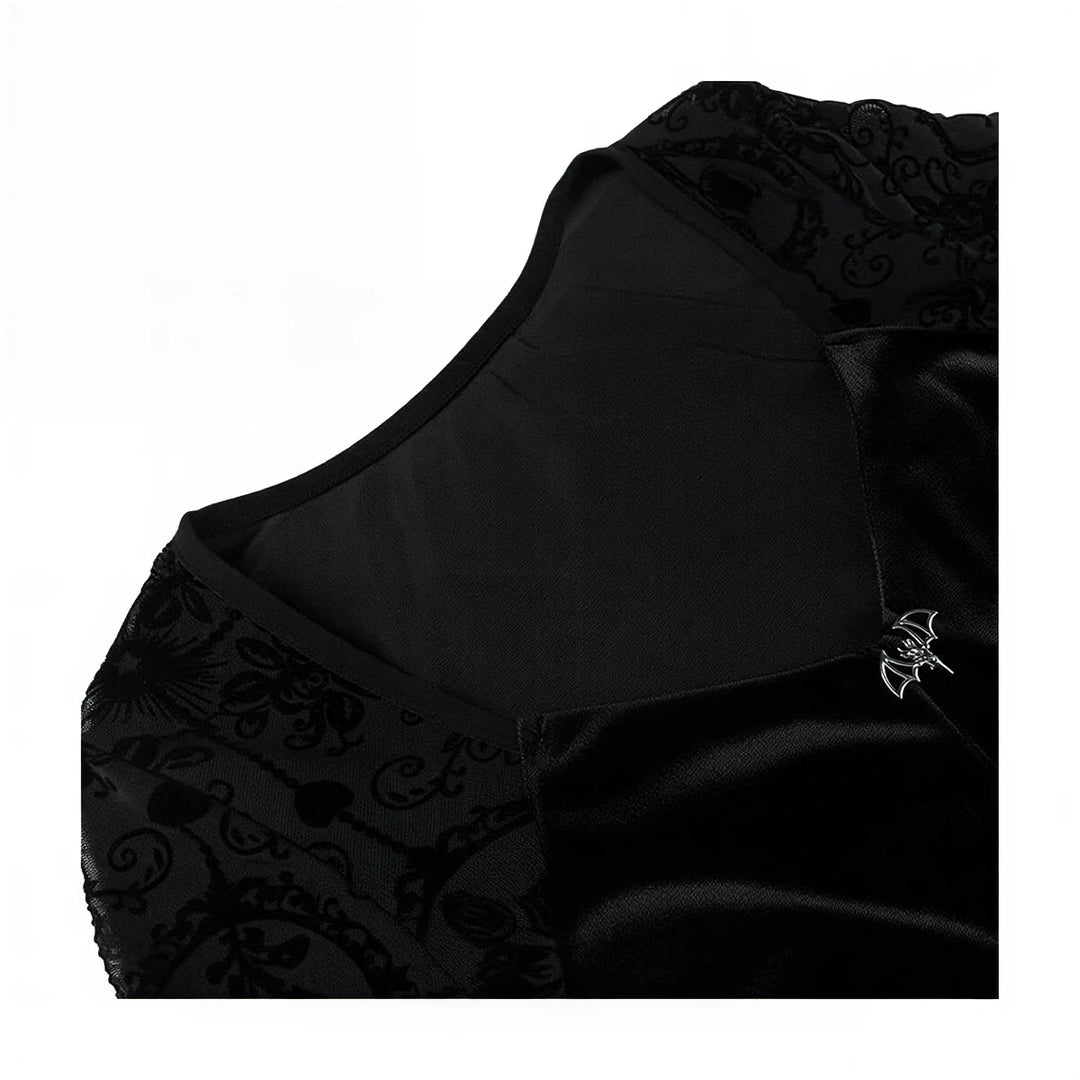 Vintage Goth Dress in black velvet with lace overlay and bat pin detail.